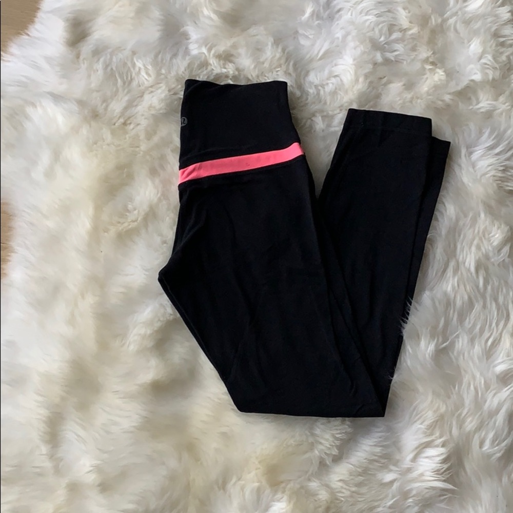 LULULEMON black with coral detail at hips